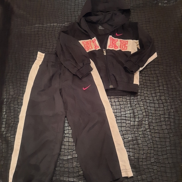 matching couple tracksuits nike